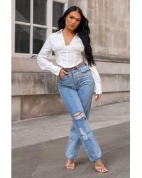 Femme Luxe - Light Wash Distressed Denim Mom Jeans - Lyst
