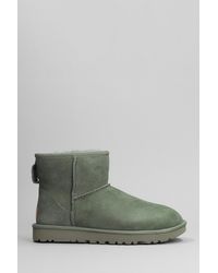 UGG - Classic Mini Ii Low Heels Ankle Boots In Green Suede - Lyst