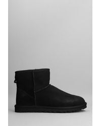 UGG Classic Mini Boots for Men - Up to 26% off | Lyst
