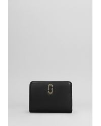 Marc Jacobs - The Mini Compact Wallet In Black Leather - Lyst