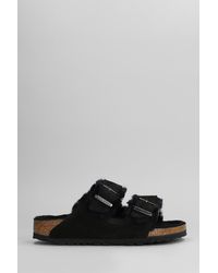 Birkenstock - Sandali flats Arizona Shearling in Camoscio Nero - Lyst
