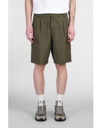 Carhartt - Shorts Cole Cargo Short in Cotone Verde - Lyst