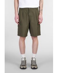 Carhartt - Shorts Cole Cargo Short in Cotone Verde - Lyst