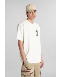 Stussy - T-Shirt in Cotone Beige - Lyst