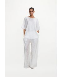 delos.land - Aurelius T-Shirt Silk Pintuck - Lyst