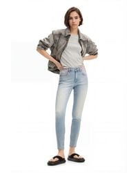 Desigual - Long Denim Pants With Flowers On The Waist - Lyst