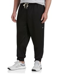 reebok sweatpants with zipper pockets