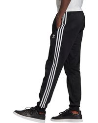 adidas superstar black track pants
