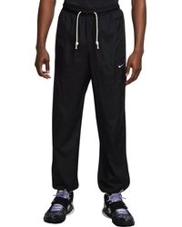 nike men's standard issue pants