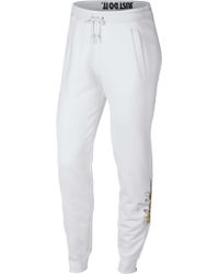 nike women's sportswear metallic rally joggers