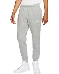 red nike club joggers