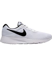 white nike shoes tanjun