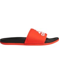 red and black adidas slides