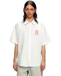 DIESEL - Kurzarm-Shirt aus Leinenmischgewebe mit Print - Lyst