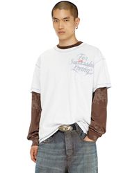 DIESEL - T-Shirt With Chest Pocket And Graphic Print - Lyst