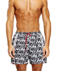 DIESEL - Swim Shorts With All-Over Logo Print - Lyst