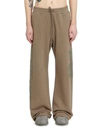 DIESEL - Treated Pants With Logo Print - Lyst