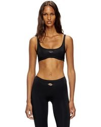 DIESEL - Brassière de sport avec cut-out à logo - Lyst