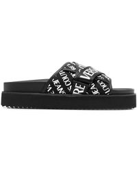 Pantofole e ciabatte da uomo di Versace Jeans Couture a partire da 58 €