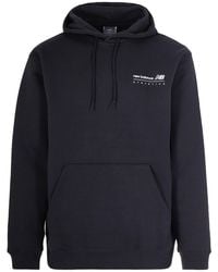 New Balance - Felpa Linear Graphic Fleece Nera - Lyst