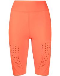 Donna Abbigliamento da Shorts da Pantaloncini lunghi e al ginocchio Shorts Biker Asmc True Pace Running di adidas By Stella McCartney in Arancione 