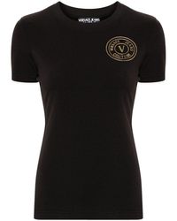 Versace - | T-shirt in cotone stretch con logo frontale | female | NERO | S - Lyst