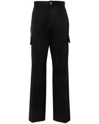 Versace - | Pantaloni cargo in cotone con tasche e ricamo | male | NERO | 50 - Lyst