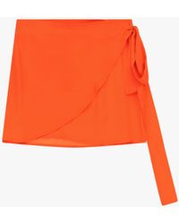Dixie - Jupe Courte Portefeuille À Nœud Latéral - Lyst