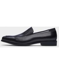 dkny slip ons