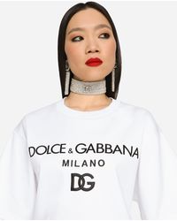 Mujer Ropa de Camisetas y tops de Tops de manga larga Top de saten de seda elastizado Dolce & Gabbana de Seda de color Marrón 