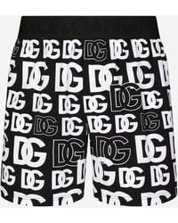Dolce & Gabbana Shorts jersey bielastico stampa logo DG - Nero