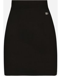 Dolce & Gabbana - Short Stretch Viscose Knit Skirt With Dg Logo - Lyst