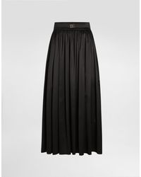Dolce & Gabbana - Skirt With Metal Logo - Lyst