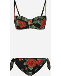 Dolce & Gabbana Slip de bikini con lazos y estampado de rosas - Multicolor