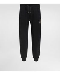 Dolce & Gabbana - Jersey Trousers With Heraldic Patch - Lyst