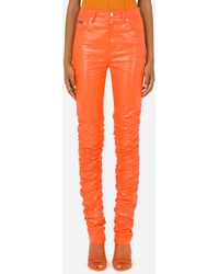 Dolce & Gabbana Hose aus beschichteter Baumwolle in Orange Damen Bekleidung Hosen und Chinos Skinny Hosen 