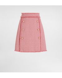 Dolce & Gabbana - Short Raschel Tweed Skirt With Decorative Dg Logo Buttons - Lyst