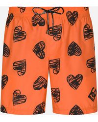 Dolce & Gabbana - Mid-length swim trunks with DG heart print - Lyst