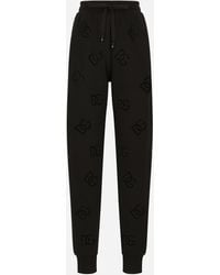 Dolce & Gabbana - Jogginghose Aus Jersey Mit Cut-Out-Stickerei Dg-Logo - Lyst