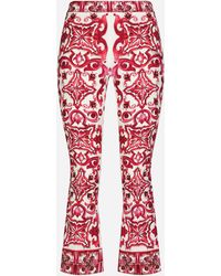 Dolce & Gabbana - Flared Trumpet-Leg Charmeuse Pants With Majolica Print - Lyst