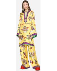 Pantalon en nylon à imprimé léopard Synthétique Dolce & Gabbana élégants et chinos Sarouels Femme Vêtements Pantalons décontractés 