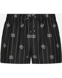 Dolce & Gabbana Short Swim Trunks With Dg Monogram Print - Black