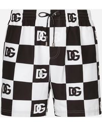 Dolce & Gabbana Bañador bóxer medio con estampado de damero y logotipos DG - Negro