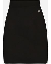 Dolce & Gabbana - Short Stretch Viscose Knit Skirt With Dg Logo - Lyst
