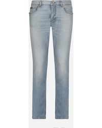 Dolce & Gabbana - Regular Fit Washed Stretch Denim Jeans With Abrasions - Lyst