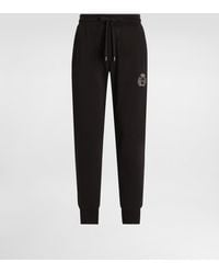 Dolce & Gabbana - Jersey Trousers With Heraldic Patch - Lyst