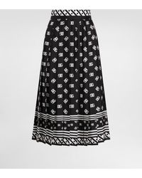 Dolce & Gabbana - Pleated Silk Twill Calf-Length Skirt With All-Over Dg Logo Scarf Print - Lyst