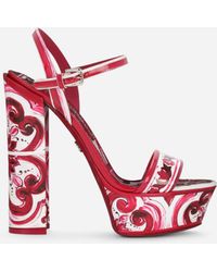 Dolce & Gabbana Plateau-Sandalette aus glänzendem bedrucktem Kalbsleder - Rot