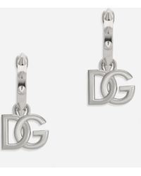 Dolce & Gabbana - Boucles d'oreilles fermoir poussette avec logo DG et clous - Lyst