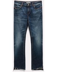 Dorothee Schumacher - Flared Ankle Jeans With Cutoff Hem - Lyst